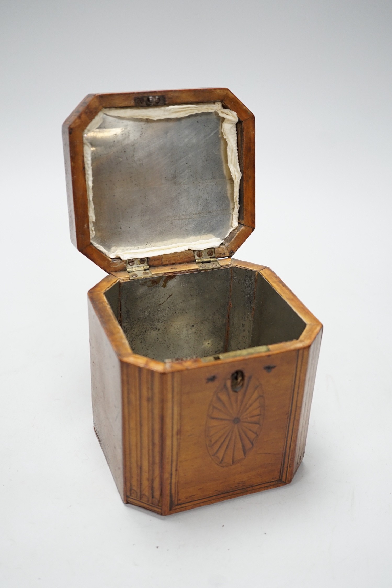 A George III octagonal shell marquetry tea caddy, 12.5cm high
